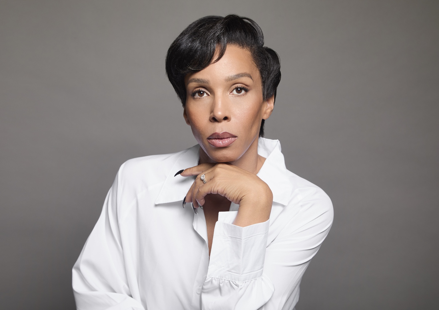 Studio beauty portrait in a white shirt