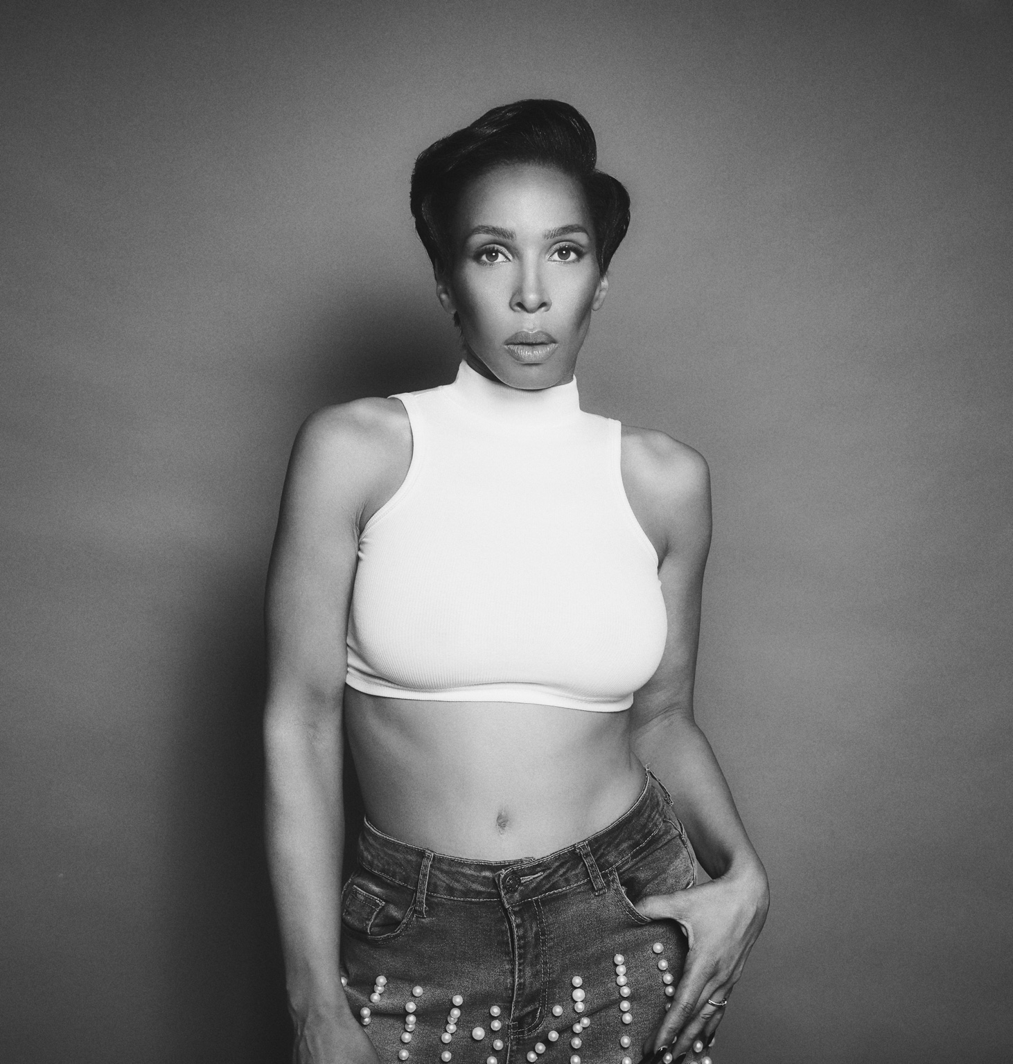 Black-and-white fashion portrait in pearl-detailed denim